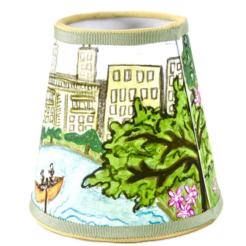 Front view of Parc lampshade showing hand-painted Central Park scene with trees, pond, rowboat and city buildings