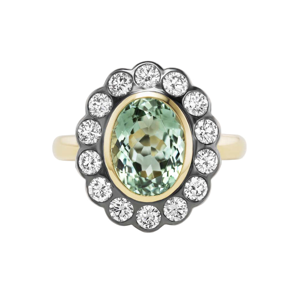 Front view of Alix ring showcasing oval green tourmaline center surrounded by white diamond halo on white background