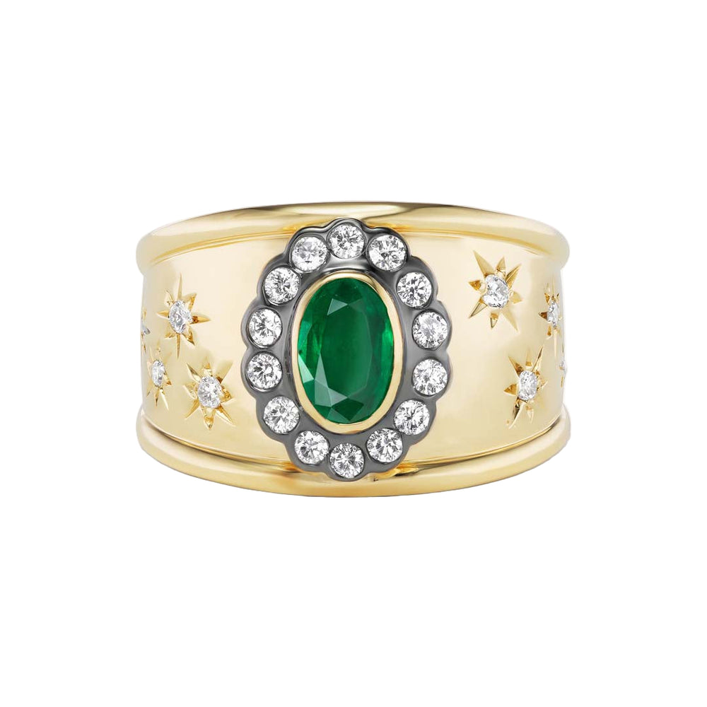 Front view of Ali Cigar Band ring in yellow gold with oval emerald center, diamond halo and starburst accents