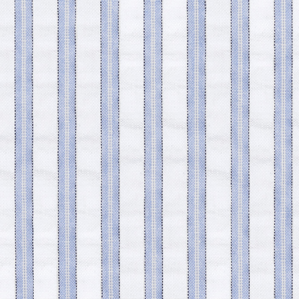 Matteo Coverlet in Azure styled on a bed