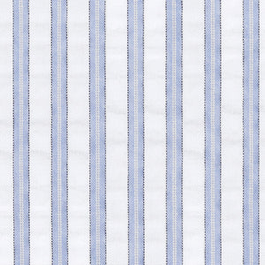 Matteo Coverlet in Azure styled on a bed