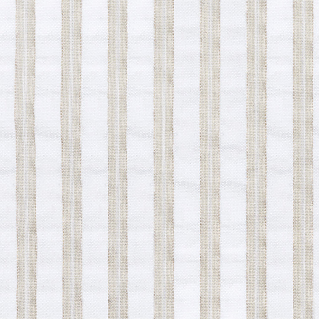 Matteo Coverlet in Natural styled on a bed