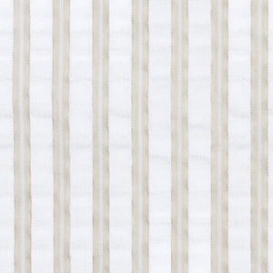 Matteo Coverlet in Natural styled on a bed