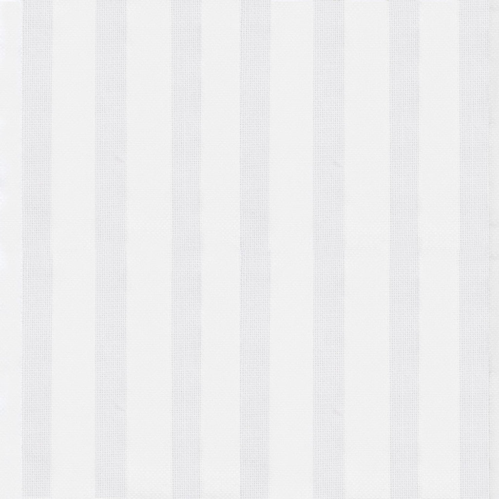 Matteo Coverlet in White styled on a bed