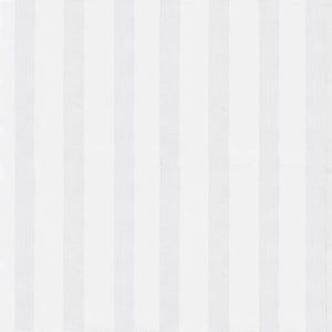 Matteo Coverlet in White styled on a bed