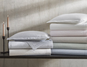 Matteo Coverlet folded in a stack