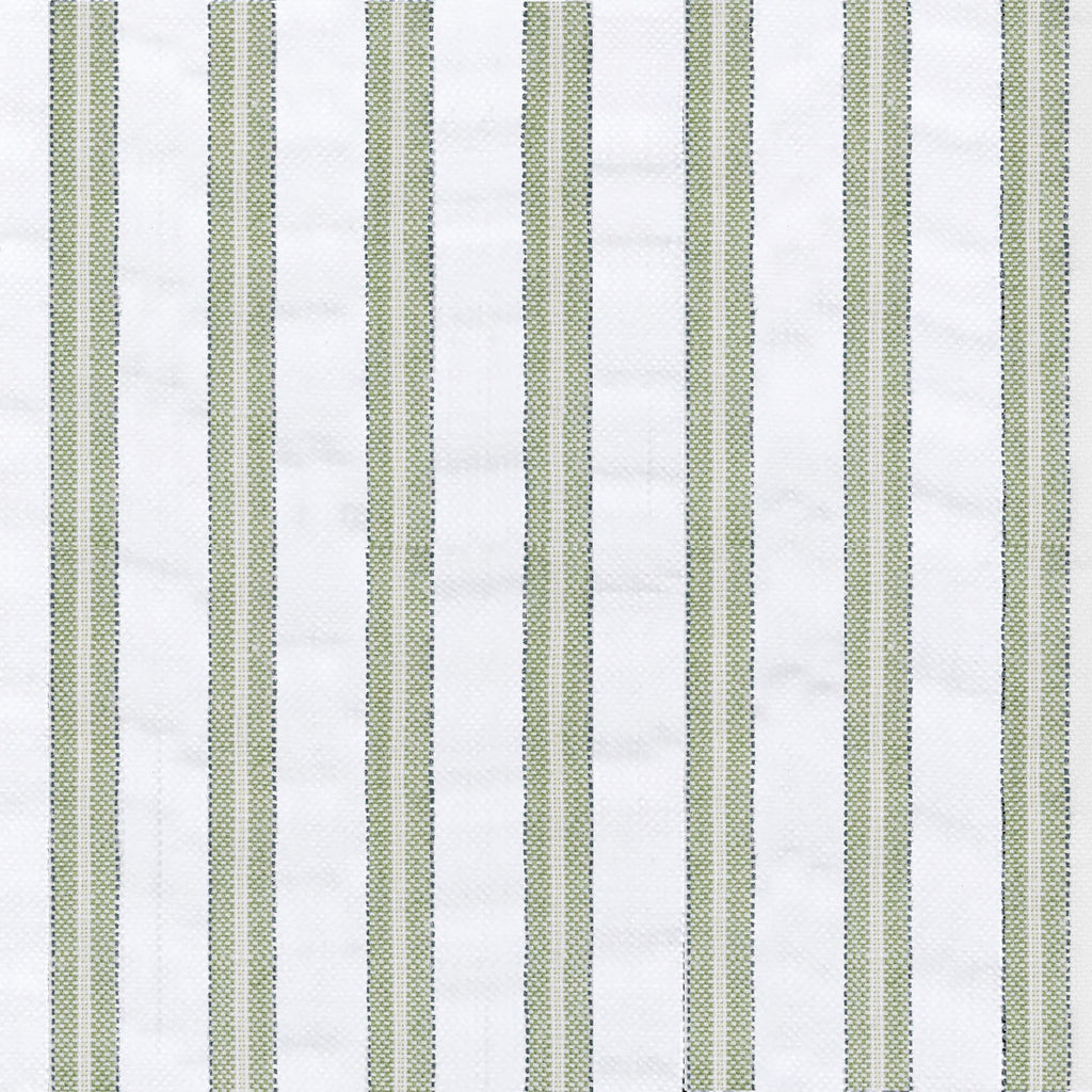 Matteo Duvet Cover in Palm styled on a bed