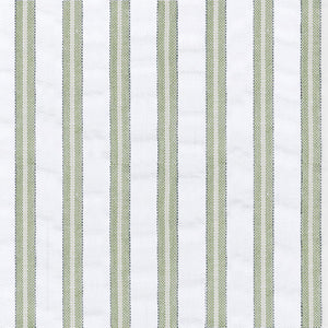 Matteo Duvet Cover in Palm styled on a bed