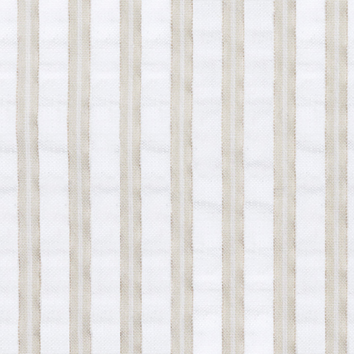 Matteo Quilt in Natural styled on a bed