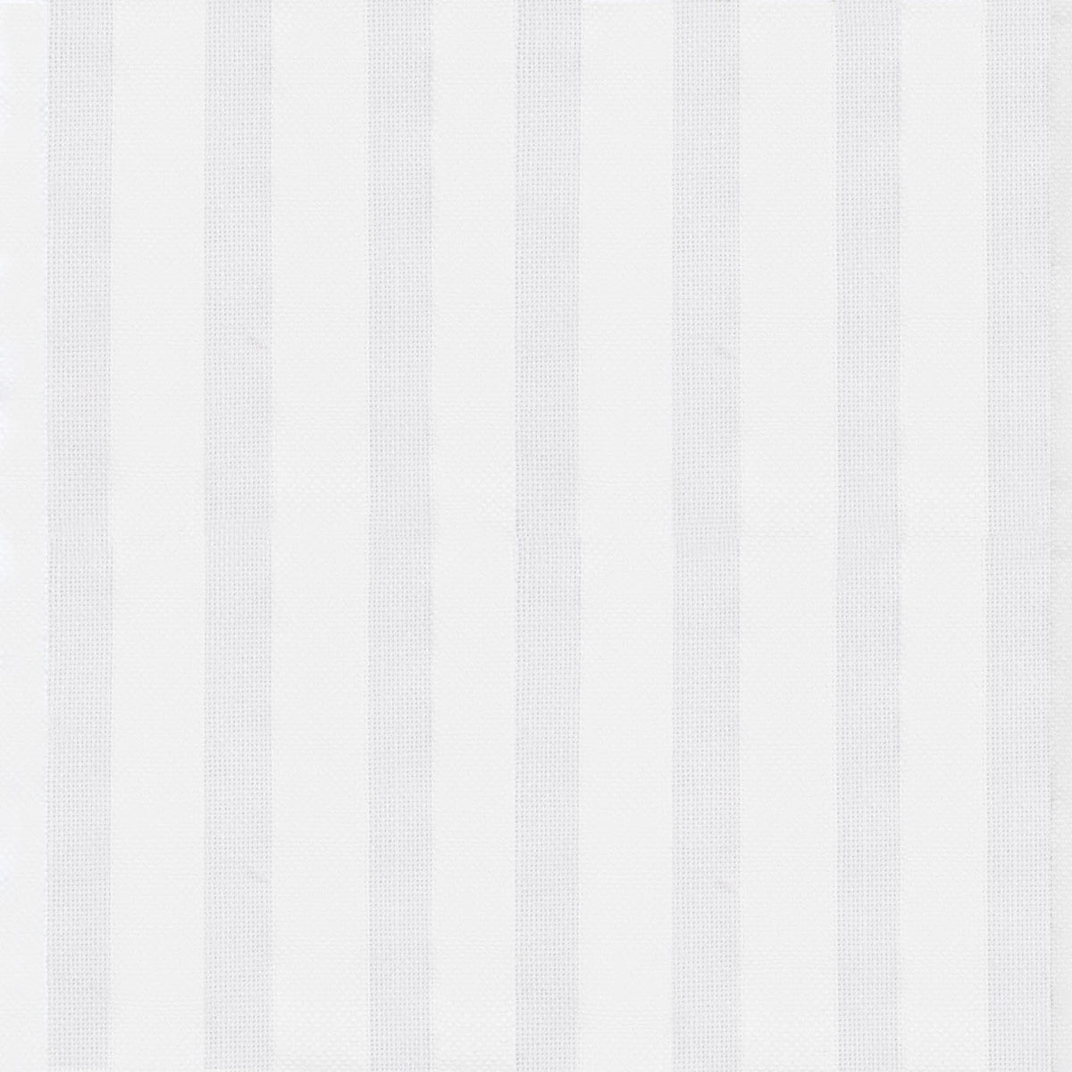 Matteo Quilt in White styled on a bed