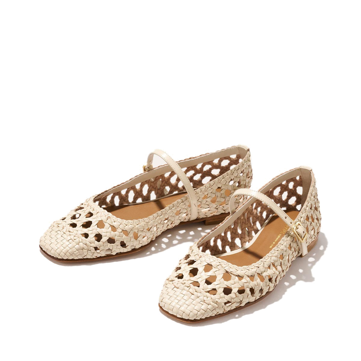 The Fonteyn Jane - Ecru Woven Leather by Margaux: beige handwoven leather flats with cutout details, closed toes, and a slim adjustable instep strap, shown on a plain light background.