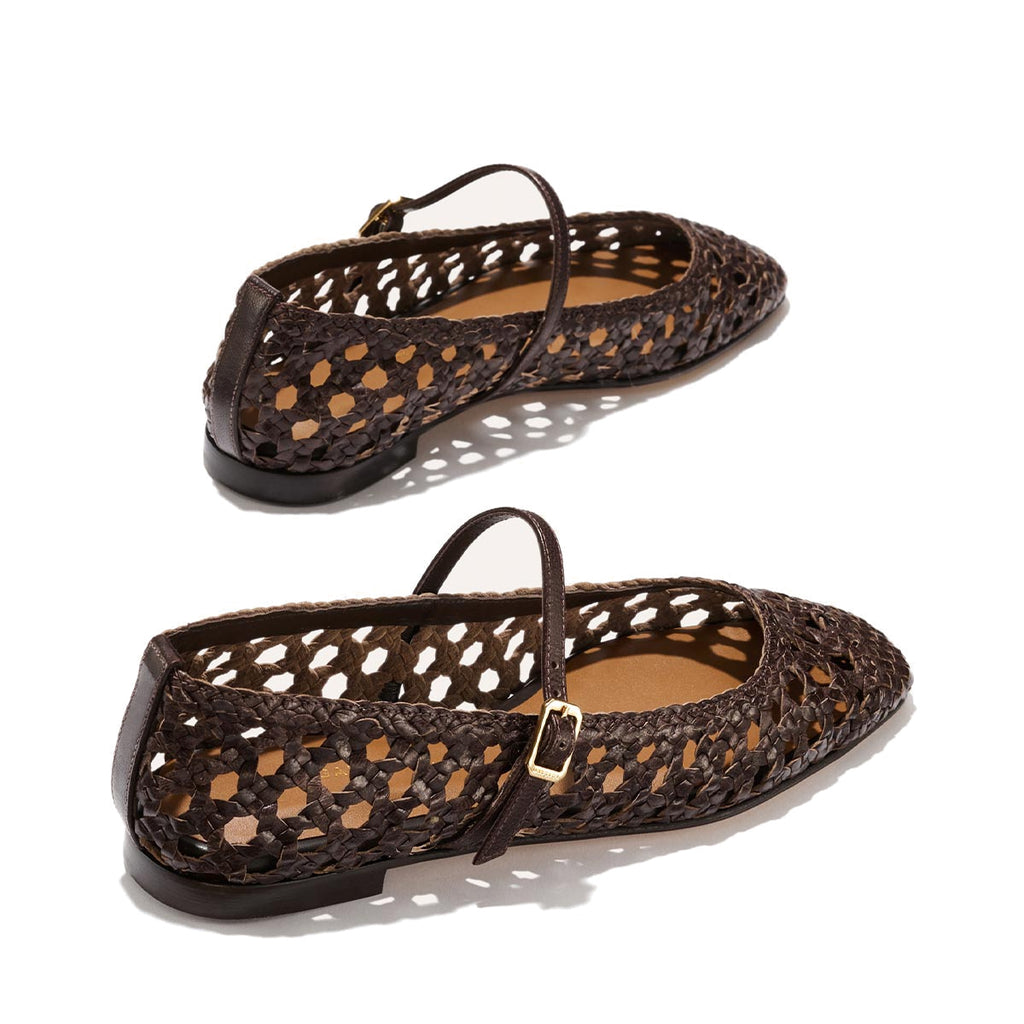 The Fonteyn Jane - Espresso Woven Leather by Margaux: dark brown handwoven Mary Jane flats with pointed toes, adjustable ankle straps, and gold buckles, shown on a light background.