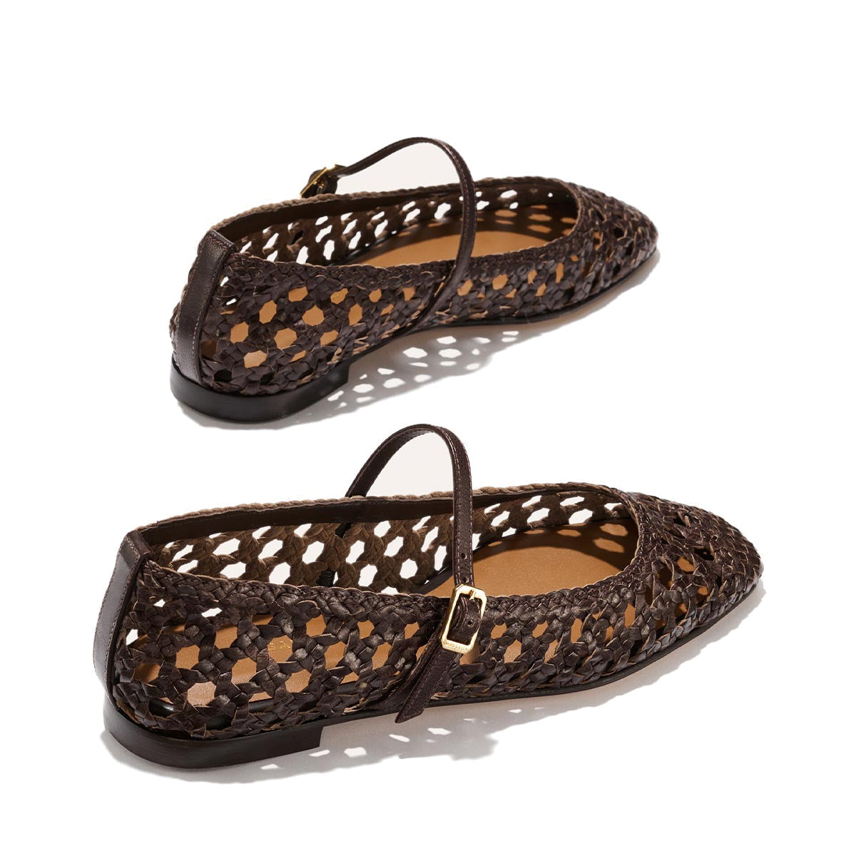 The Fonteyn Jane - Espresso Woven Leather by Margaux: dark brown handwoven Mary Jane flats with pointed toes, adjustable ankle straps, and gold buckles, shown on a light background.