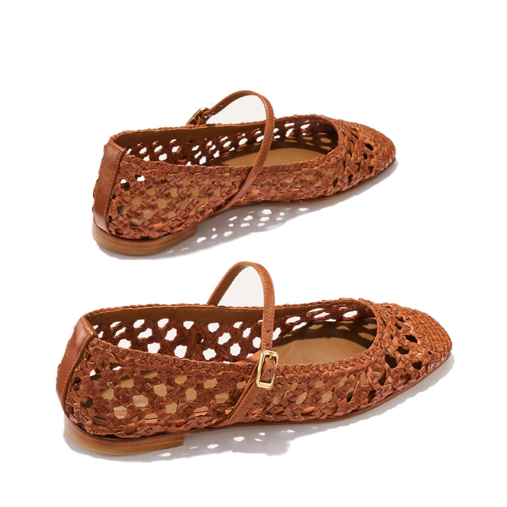 The Fonteyn Jane - Saddle Woven Leather flats by Margaux feature handwoven brown leather, a pointed toe, adjustable strap, airy cut-outs, and flat soles, shown against a plain light background.