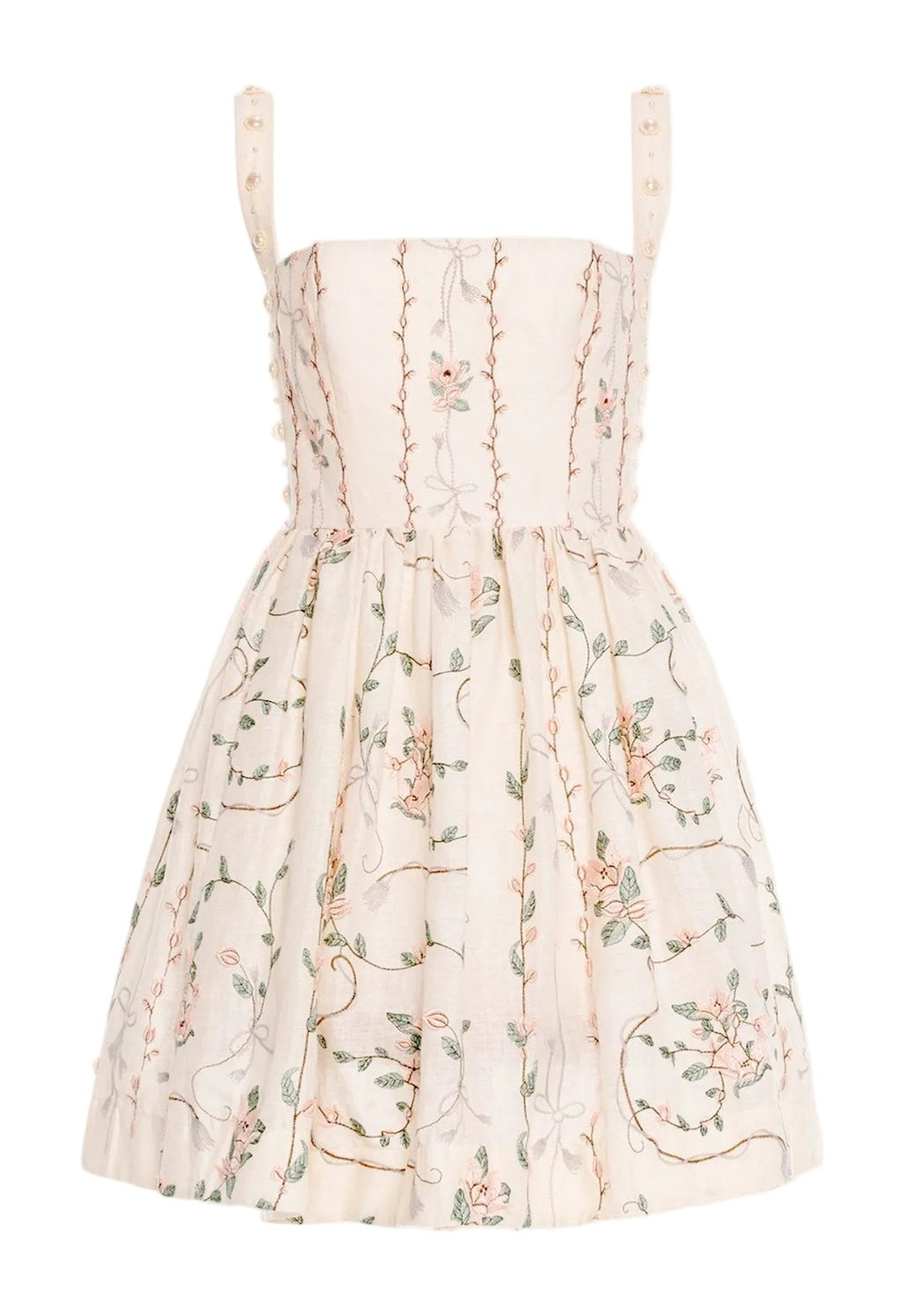 Front view of Mielero Mini Navegante Mini Dress showcasing pearl straps and embroidered floral skirt on white background