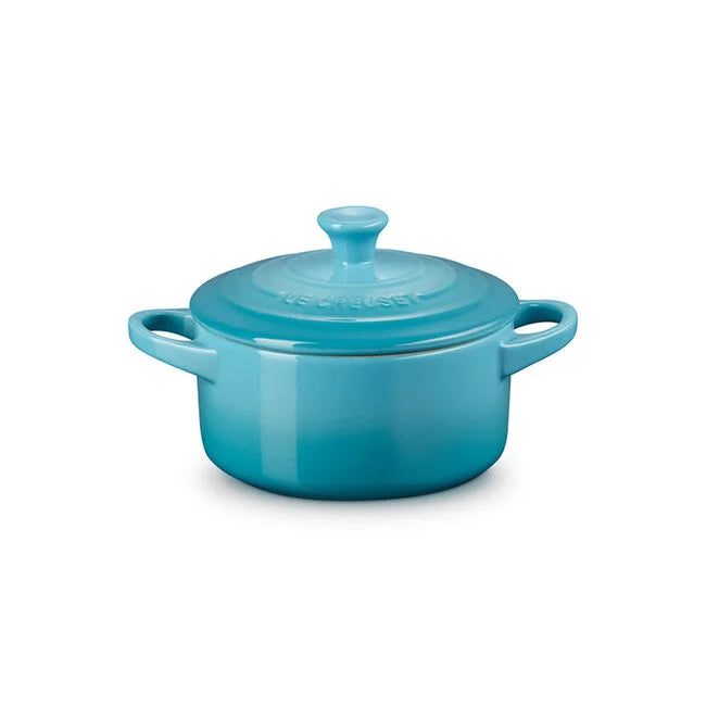 Front view of Mini Round Cocotte in Caribbean showcasing its lidded round design and side handles with a white background
