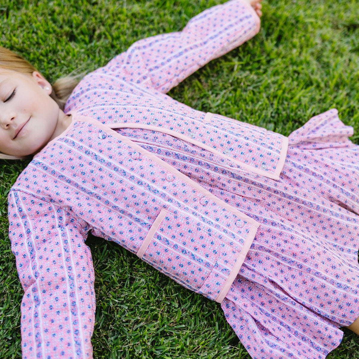 >The Girls’ Rosa Vine Smocked Dress with Flutter Sleeves