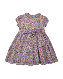 Floral dress with a bow on a white background