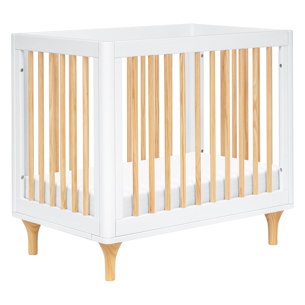 Front three-quarter view of the Lolly 4-in-1 Convertible Mini Crib showcasing white and natural finish on a white background