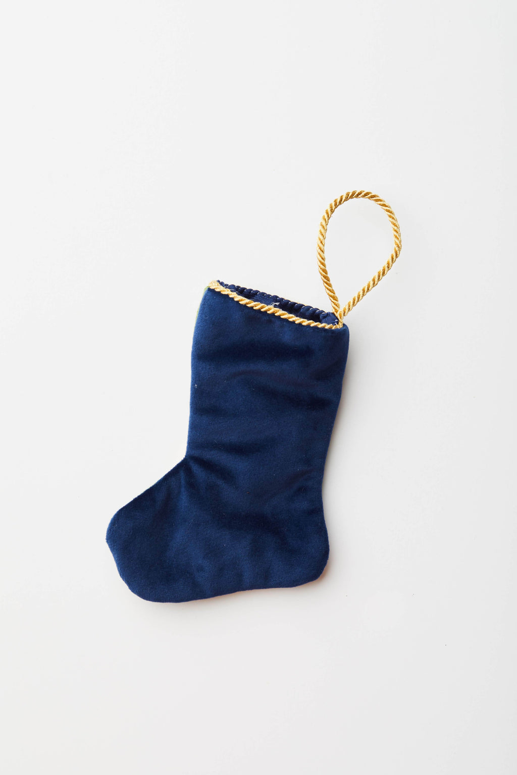 Back view of Choo Choo Train needlepoint stocking with solid navy blue velvet backing