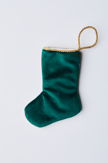 Back view of Candy Stripe Christmas needlepoint stocking with solid green velvet backing