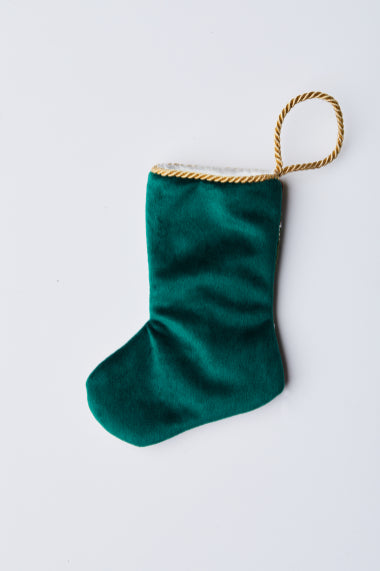 Back view of Holiday Cornucopia needlepoint stocking with solid green velvet backing