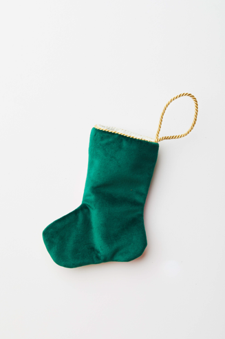 Back view of Naughty Bauble Stockings with solid green velvet backing