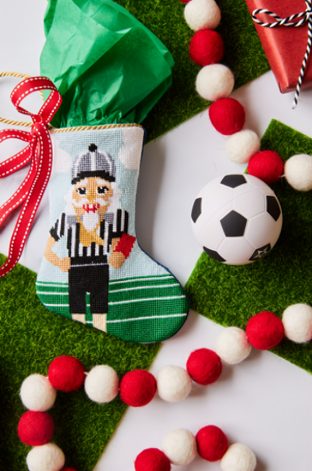 Sports-themed Bauble Stockings styled with sporty holiday accents and soccer ornaments