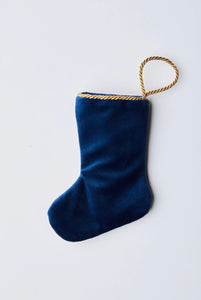 Back view of Santa's Bountiful Sleigh needlepoint stocking with solid navy blue velvet backing