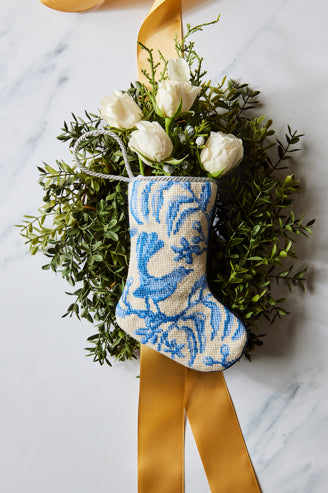 Bauble Stockings nestled on holiday greenery with festive details