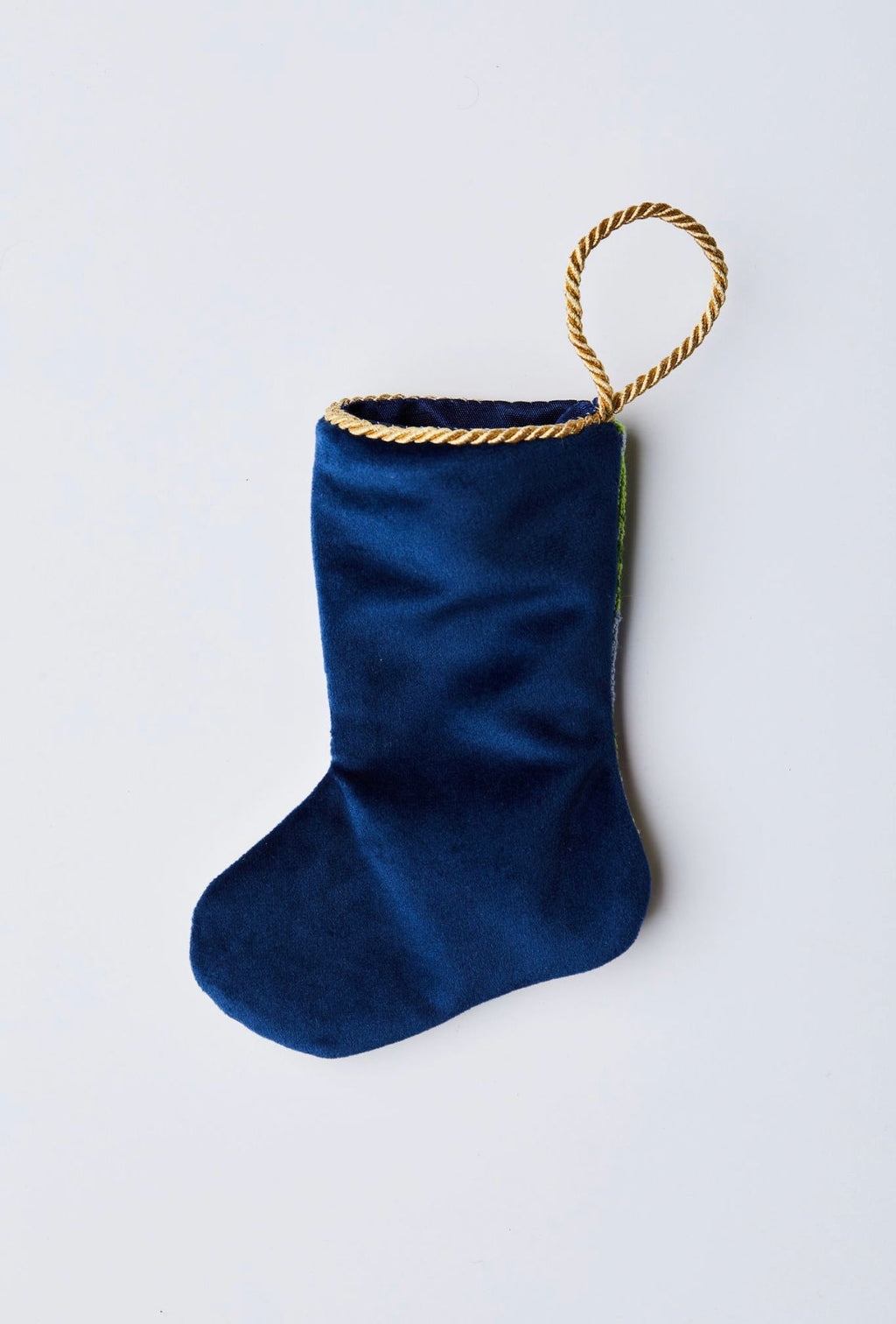 Back view of Sugary Sweet Nutcracker in Blue needlepoint stocking with solid navy blue velvet backing