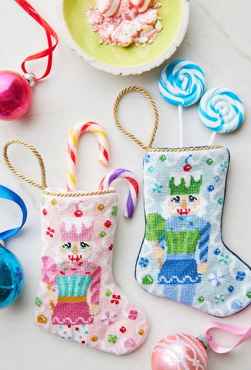 Bauble Stockings displayed with colorful candies and festive sweet-themed decorations