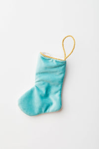 Back view of Woodland Creatures needlepoint stocking with solid blue velvet backing