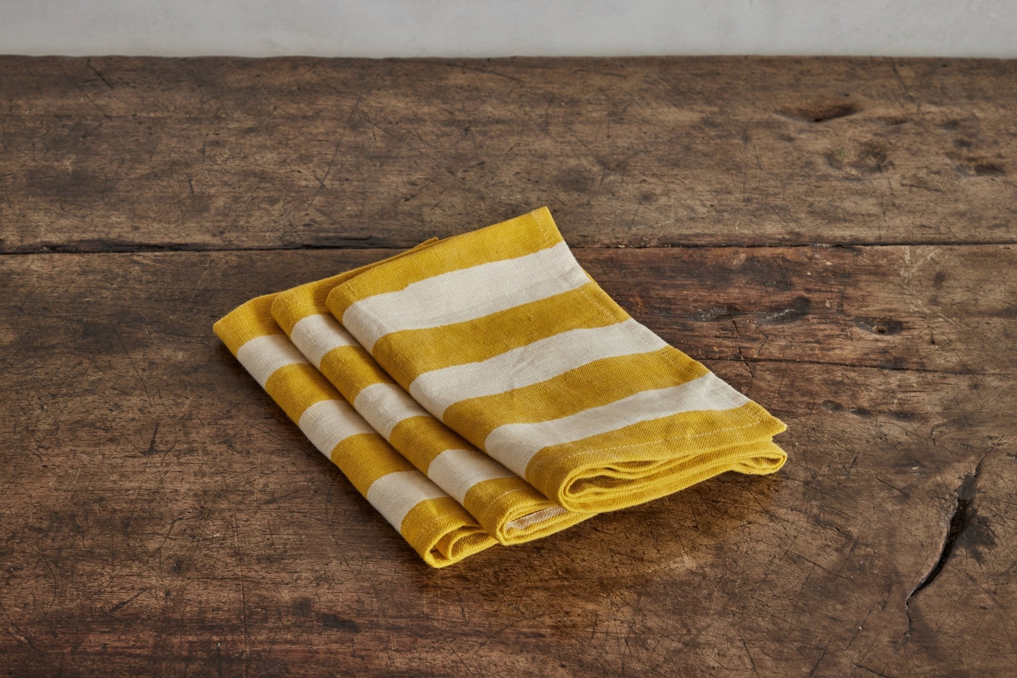 Carnival Dish Towel in Mustard