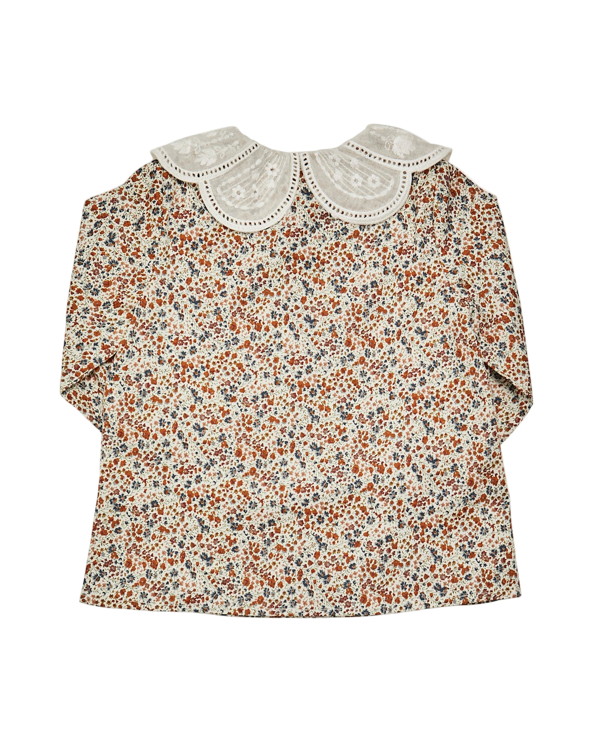 Floral blouse with lace collar on a white background