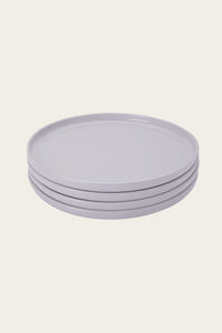 stack of four gray Recette plates