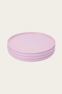 stack of four pink recette dishes