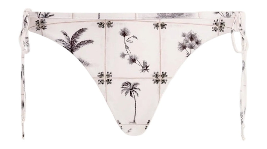 Front view of Ocaso Arena Bikini Bottom showcasing adjustable side ties, hip bows, and hand embroidery on white background