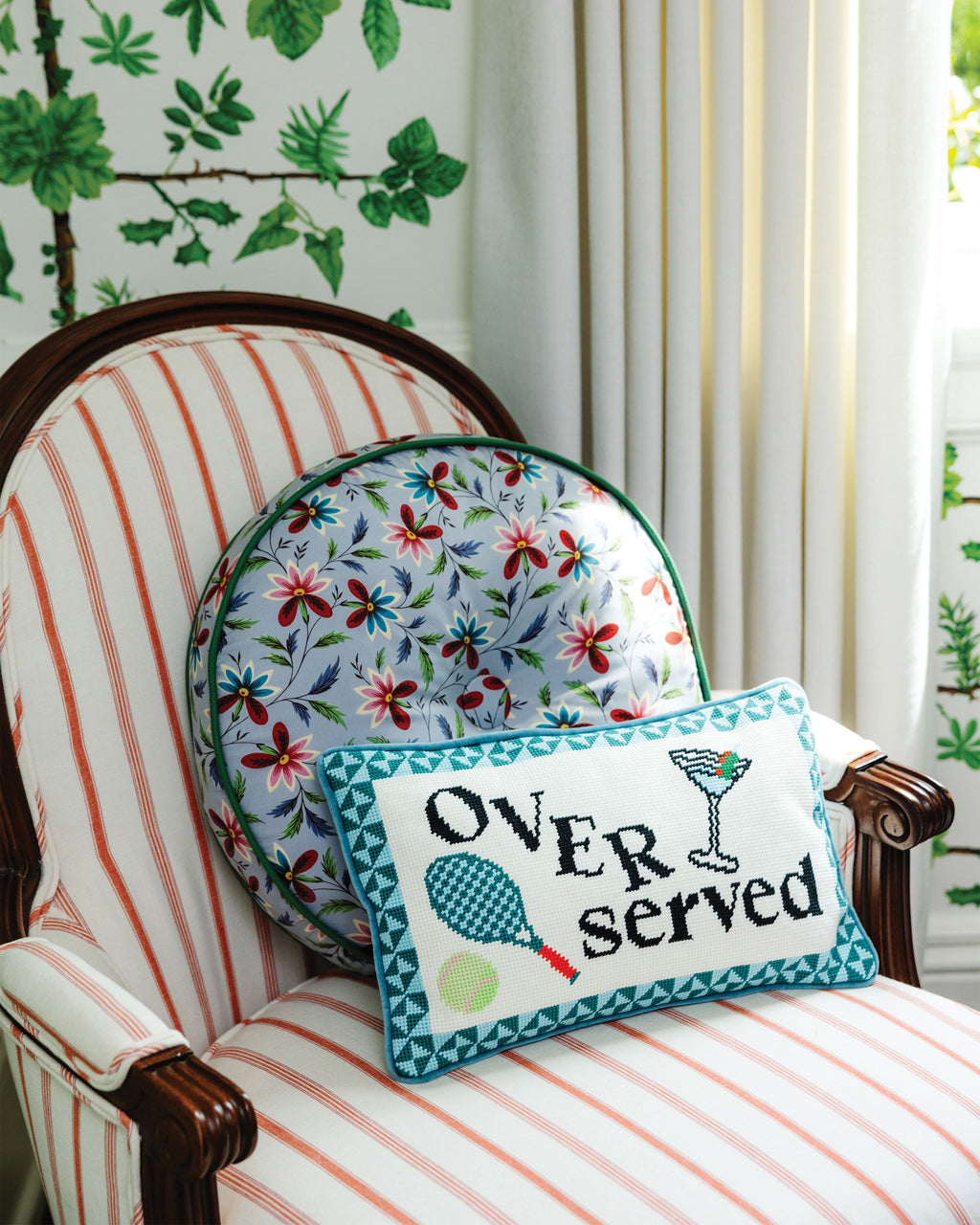 Overserved Needlepoint Pillow - styled on chair