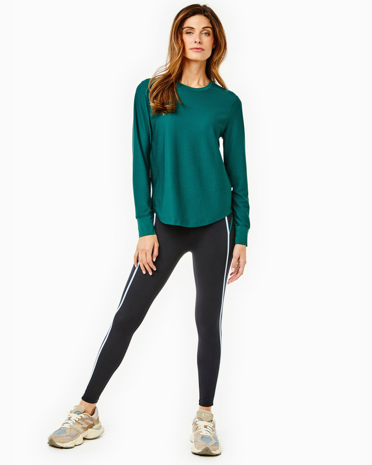 Model is wearing the Palmetto Long Sleeve in Ivy with the Chestnut Legging in Black