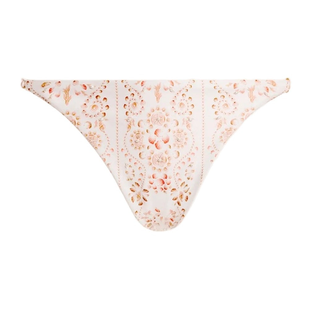 Front view of Palmira Playa Bikini Bottom with low-rise cut, hand-illustrated print, and embroidered detailing on white