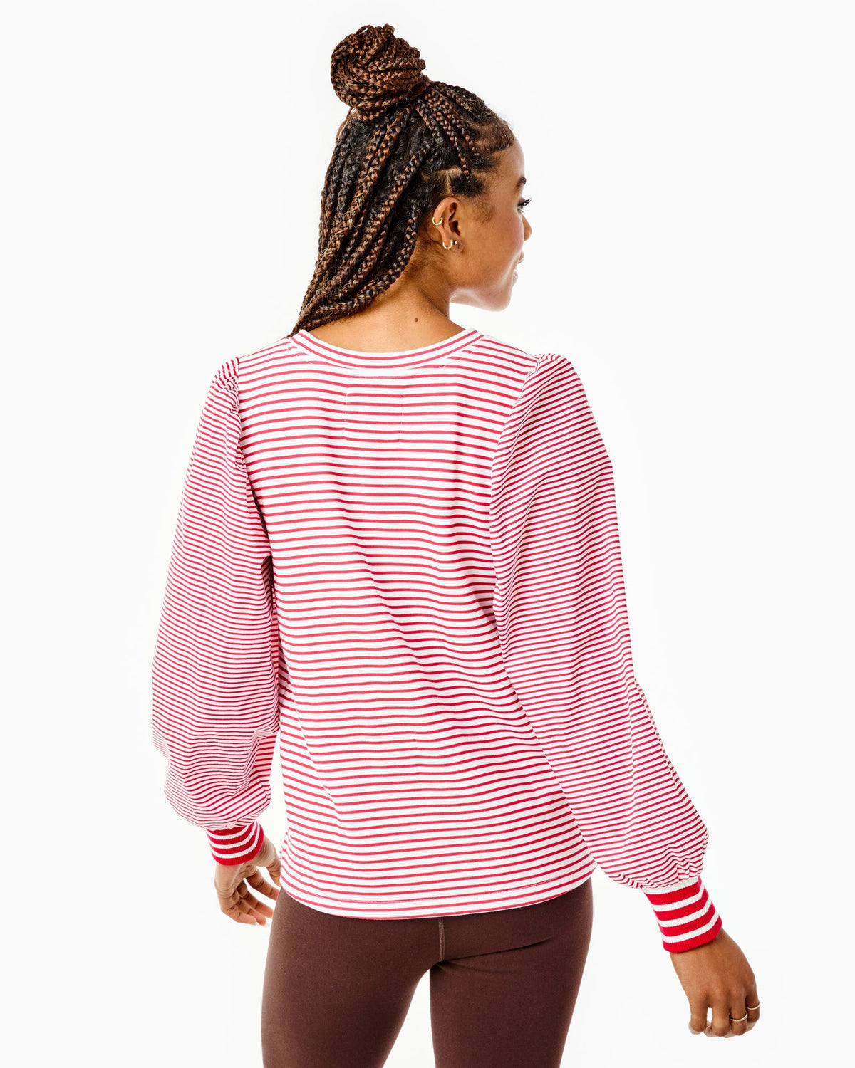 Model is wearing the Penny Pullover in Super White/ Cherry Stripes with the University Flare Pants in Chocolate