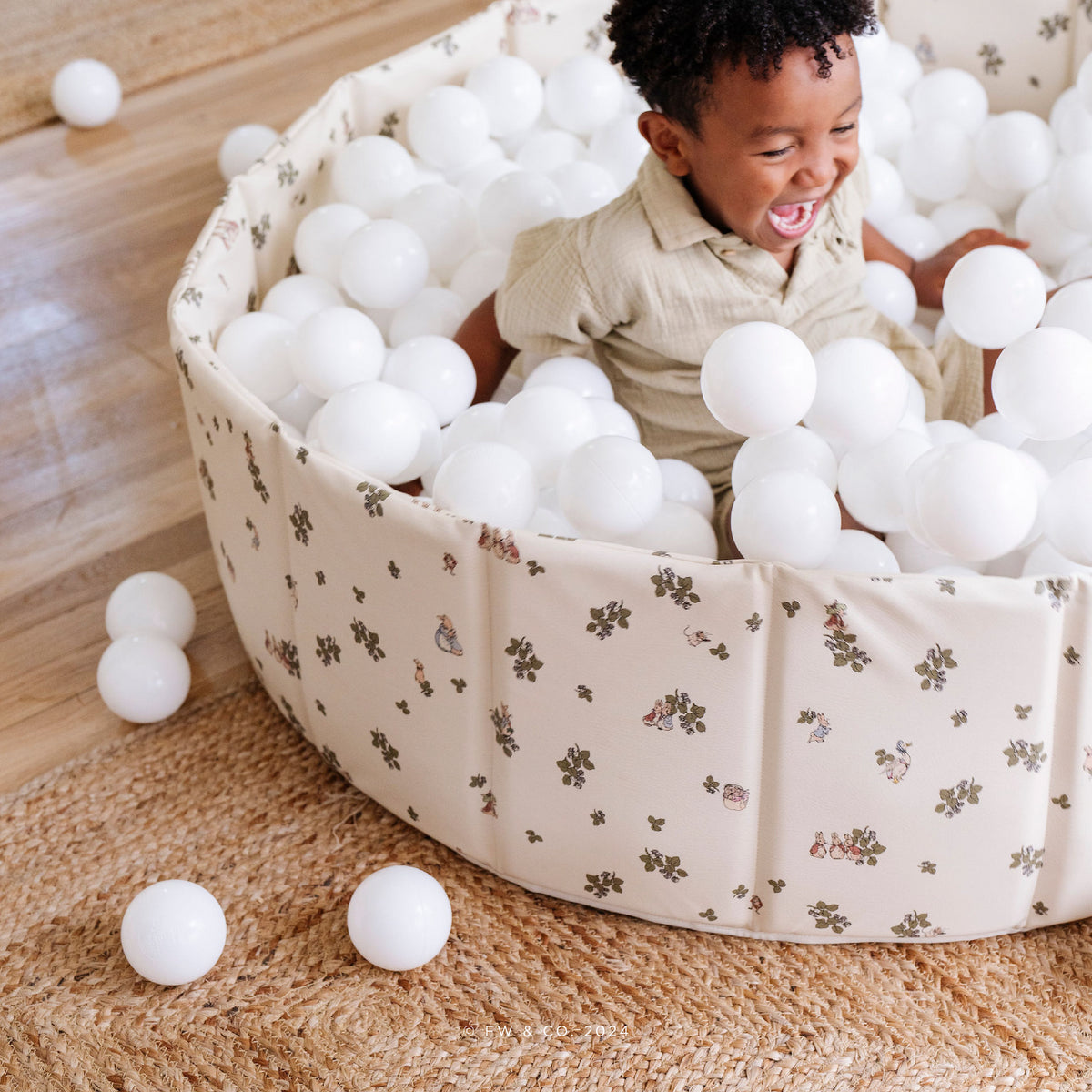Peter Rabbitª@lifestyle image of little boy playing in ball pit