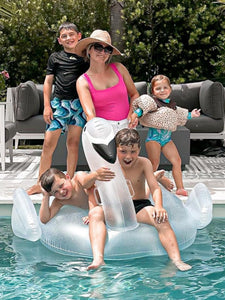 pink dreamsculpt square neck tank one piece swimsuit with tummy control fit on model with family poolside