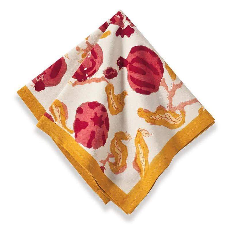 Folded view of Pomegranate Napkins, Set of 6 showcasing hand-painted pomegranate motifs and gold borders on a white background