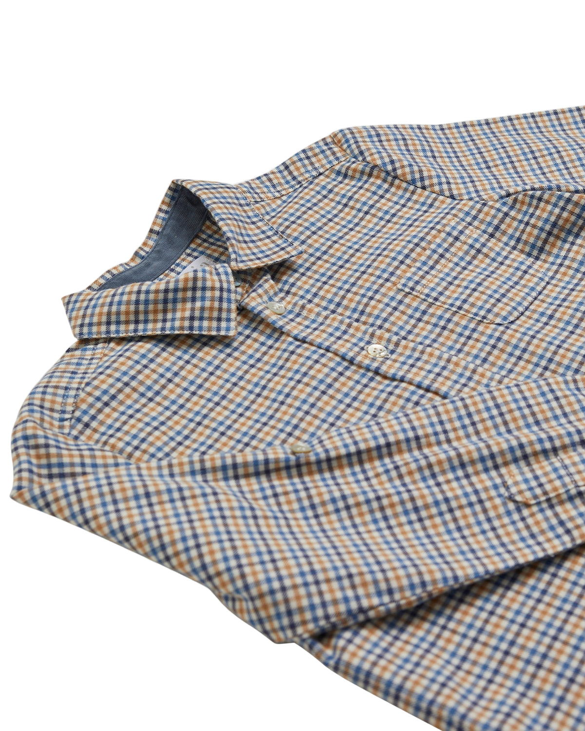 Folded checkered shirt with blue and brown pattern on a white background