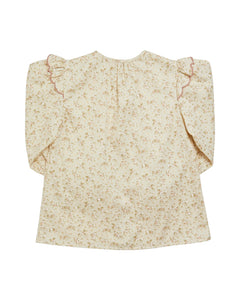 Floral blouse with ruffled sleeves on a white background