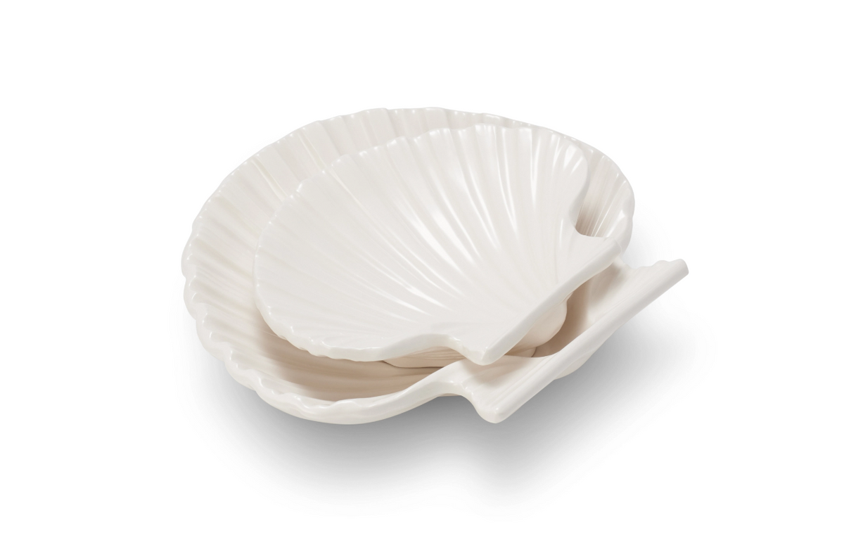 Angled view of Shell Dishes, Set of 2 showcasing scallop shell shapes and gold edging on a white background