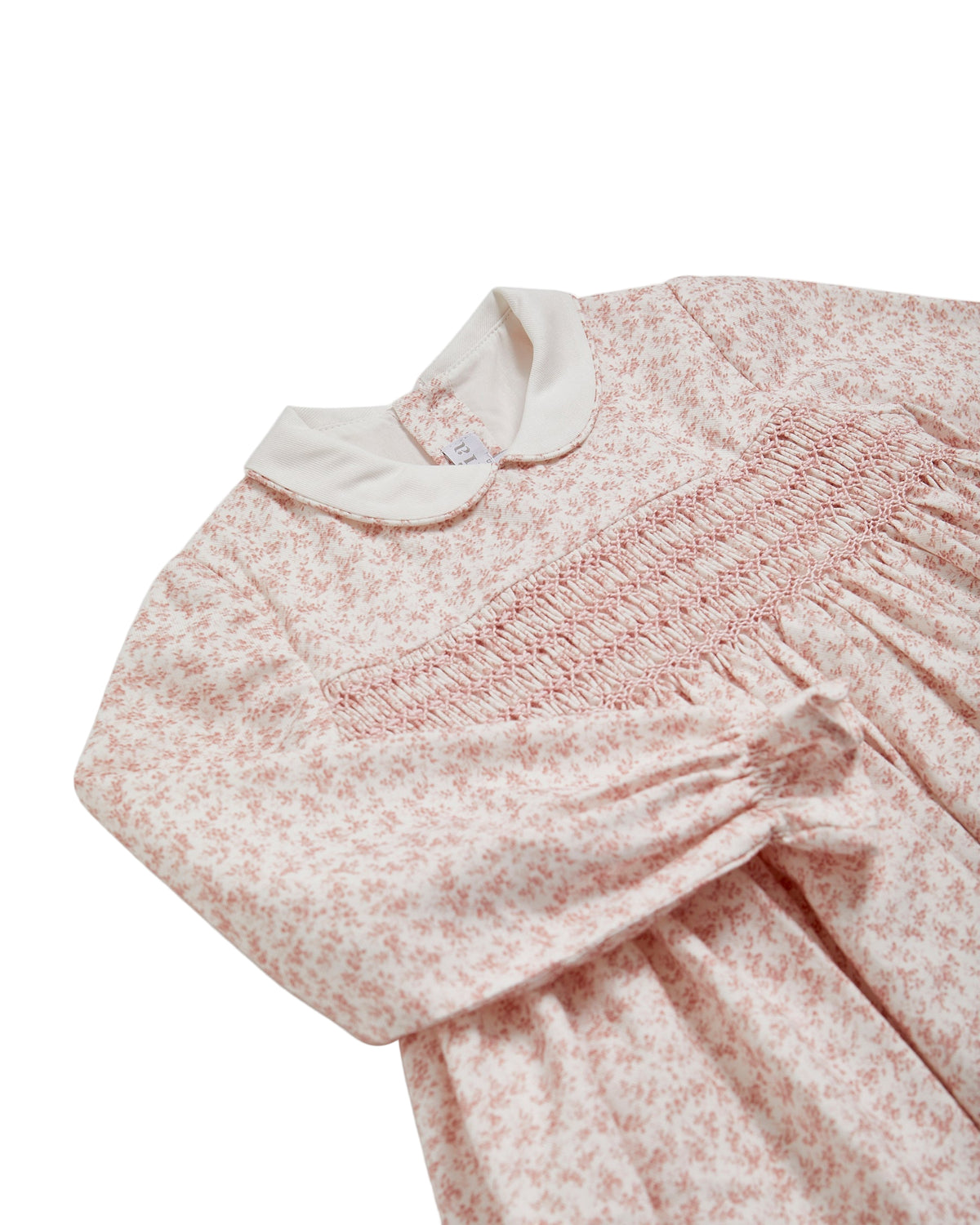 Floral dress with long sleeves on a white background