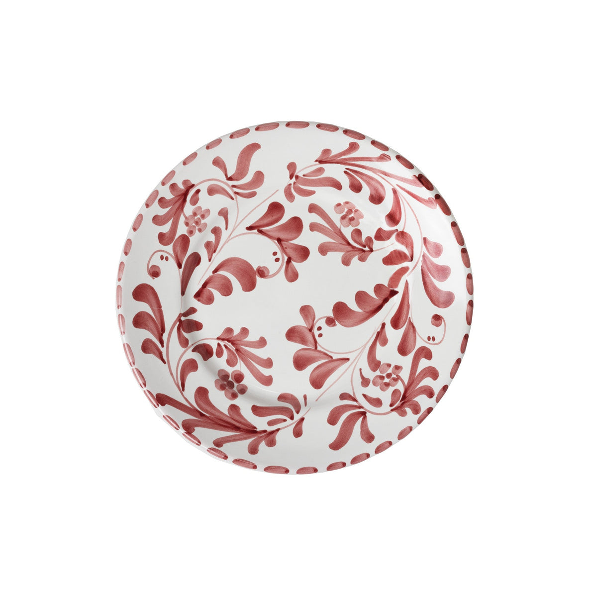 Front view of Salad and Dessert Plate in Vino Tinto showcasing red leafy impressions on white ceramic on white background